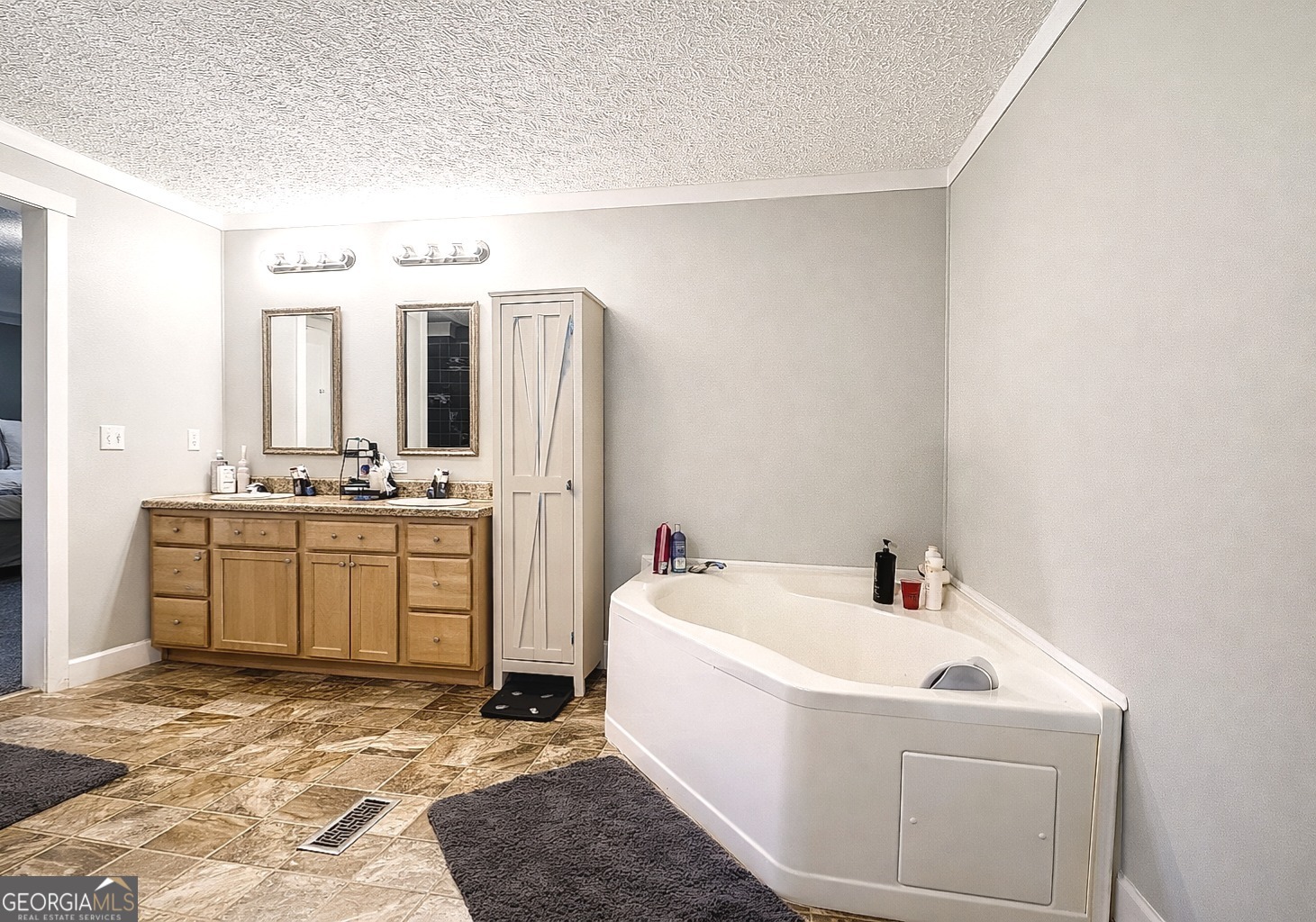 1391 Blue Springs Road Buckhead, GA 30625 - Photo 27 of 36 a bathroom with a sink and a mirror