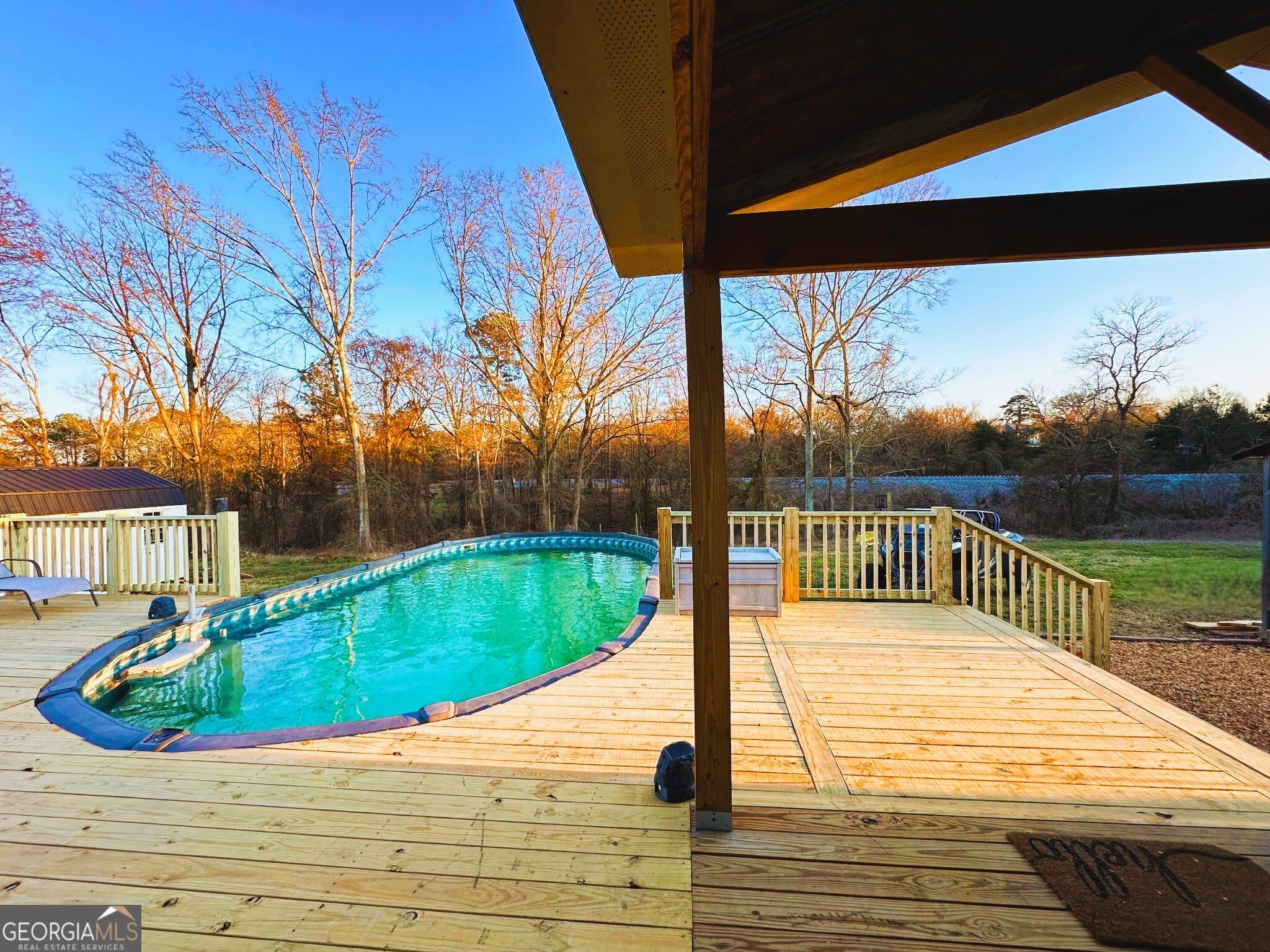 1391 Blue Springs Road Buckhead, GA 30625 - Photo 31 of 36 a view of a swimming pool with a patio