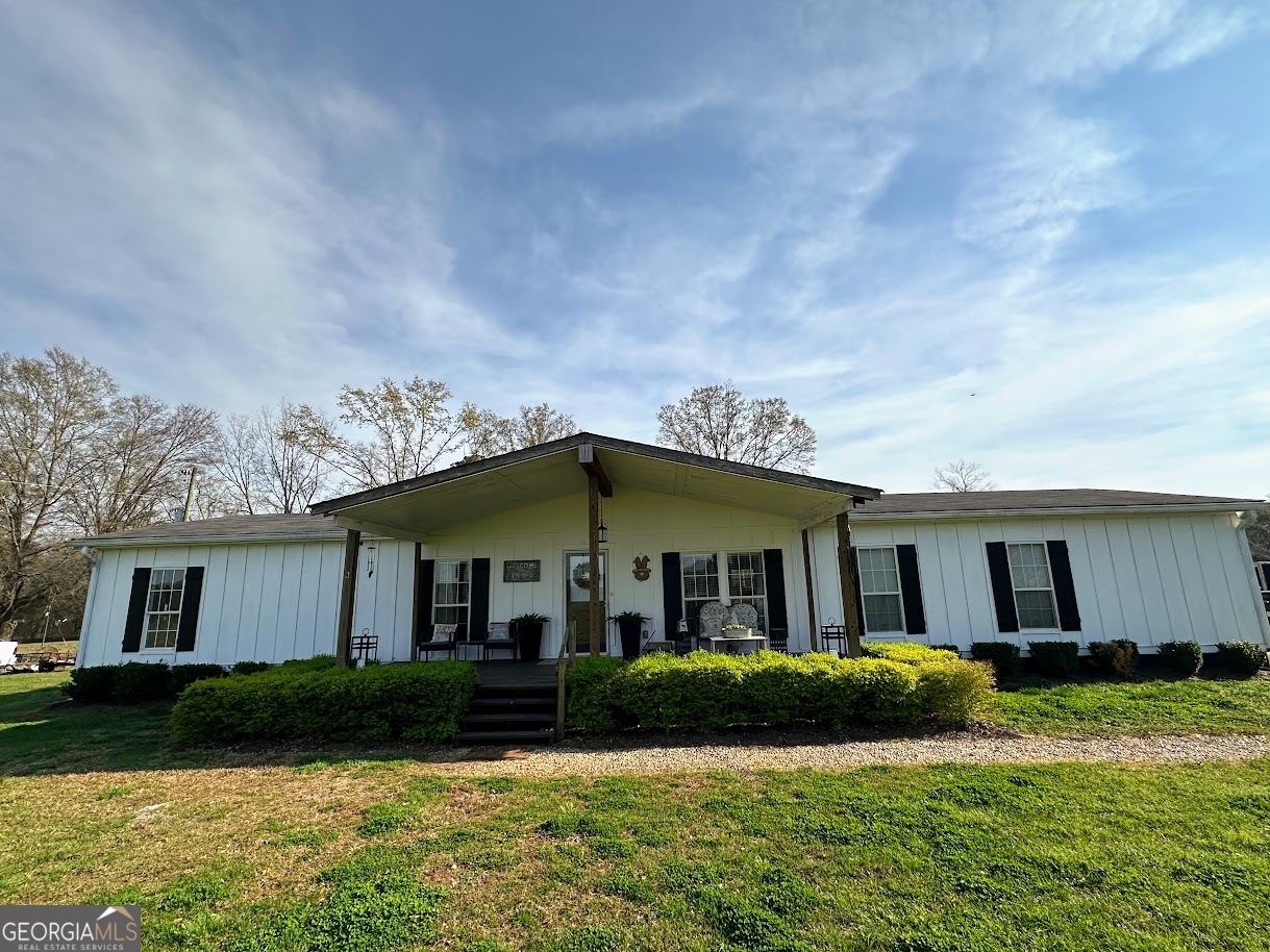 1391 Blue Springs Road Buckhead, GA 30625 - Photo 7 of 36 a view of a yard in front of a house
