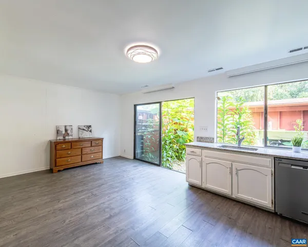 a room with furniture and window