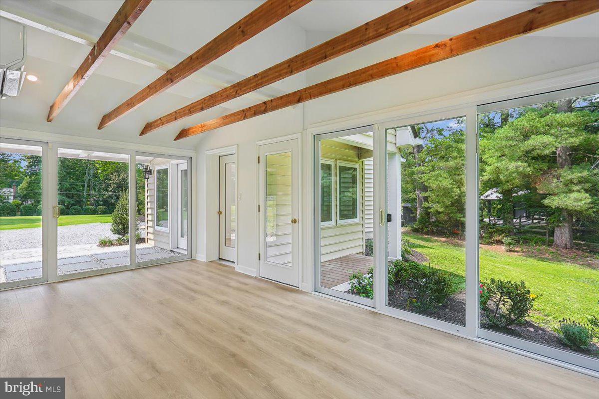 14811 Springfield Road Germantown, MD 20874 - Photo 39 of 116 Brand new sunroom! those beams are gorgeous!