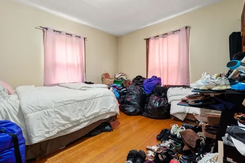 a bed room with a bed and a couch