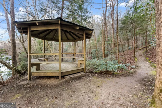 a backyard of a house with a yard and garden