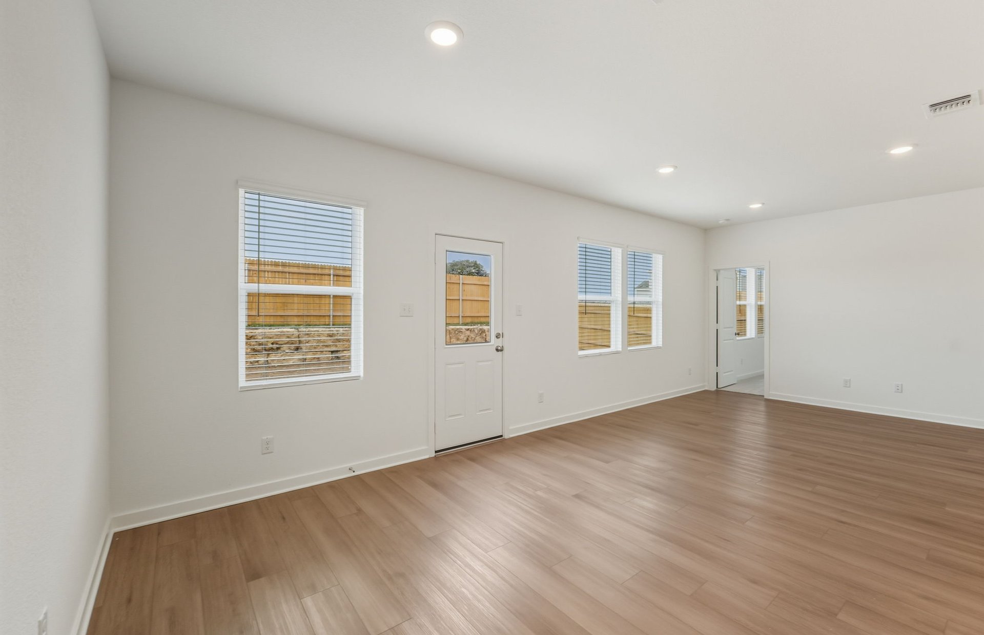 3019 Titus Court Temple, TX 76501 - Photo 10 of 29 an empty room with wooden floor and windows