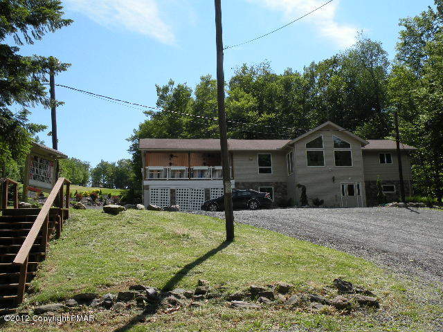335 Fawn Road Pocono Lake, PA 18347 - Photo 12 of 12 a view of a house with yard and sitting area