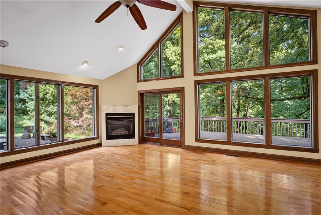 142 Riding Trail Lane Pittsburgh, PA 15215 - Photo 18 of 49 Vaulted ceilings and wood floors enhance the spacious family room.