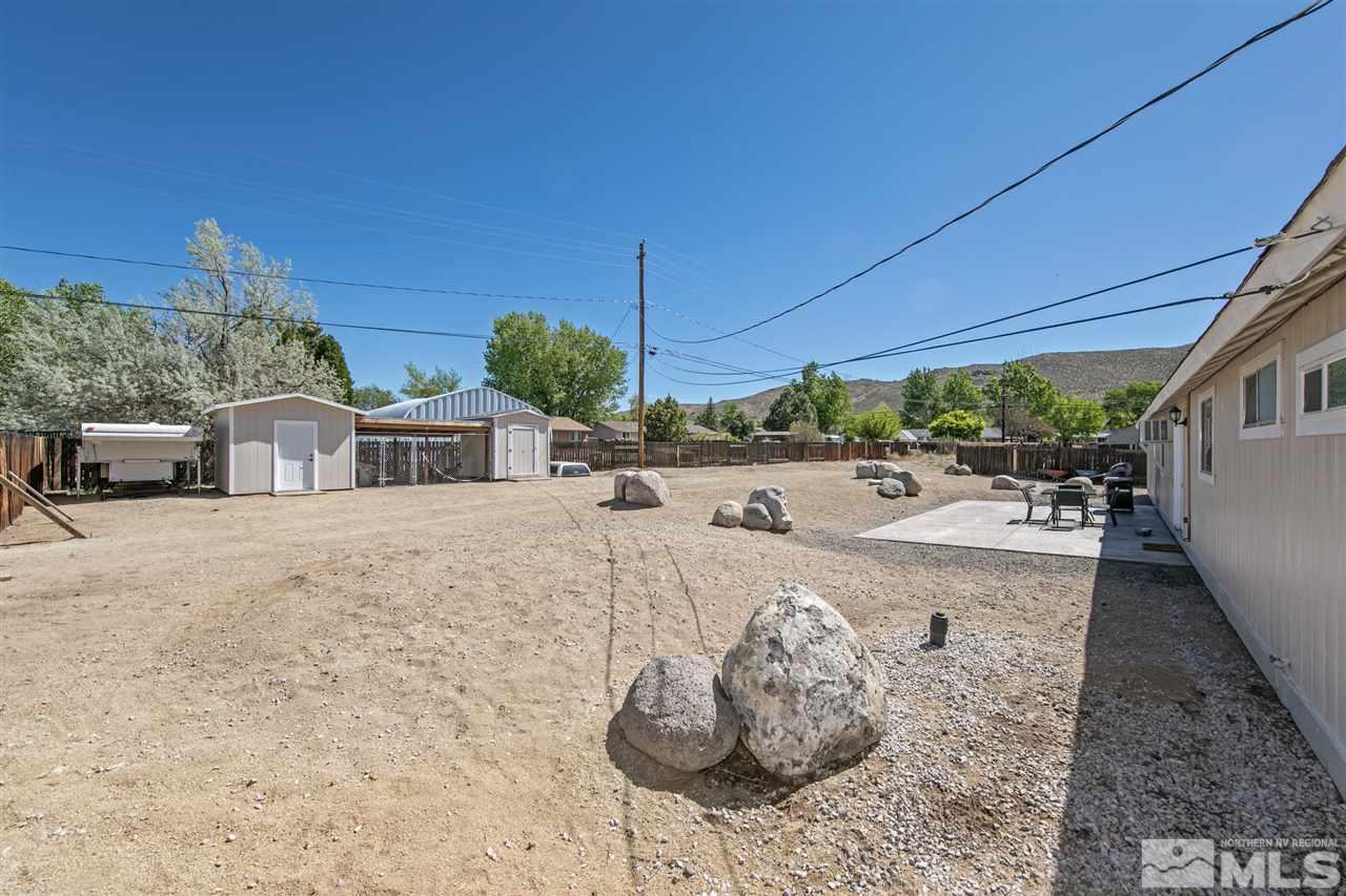 3600 Peregrine Court Reno, NV 89508 - Photo 22 of 36 a view of a white house with a swimming pool