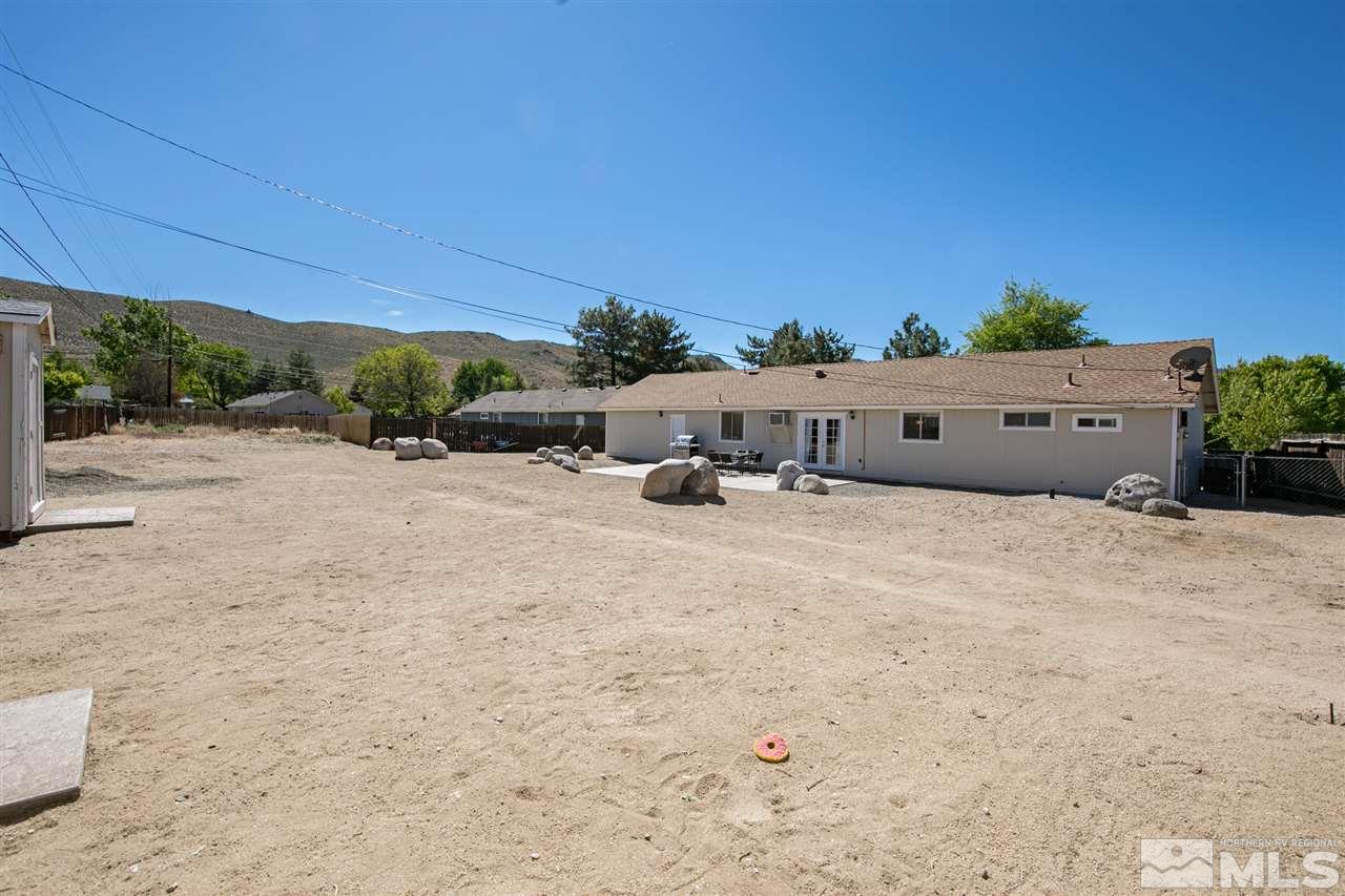 3600 Peregrine Court Reno, NV 89508 - Photo 23 of 36 a view of a car park in front of a house