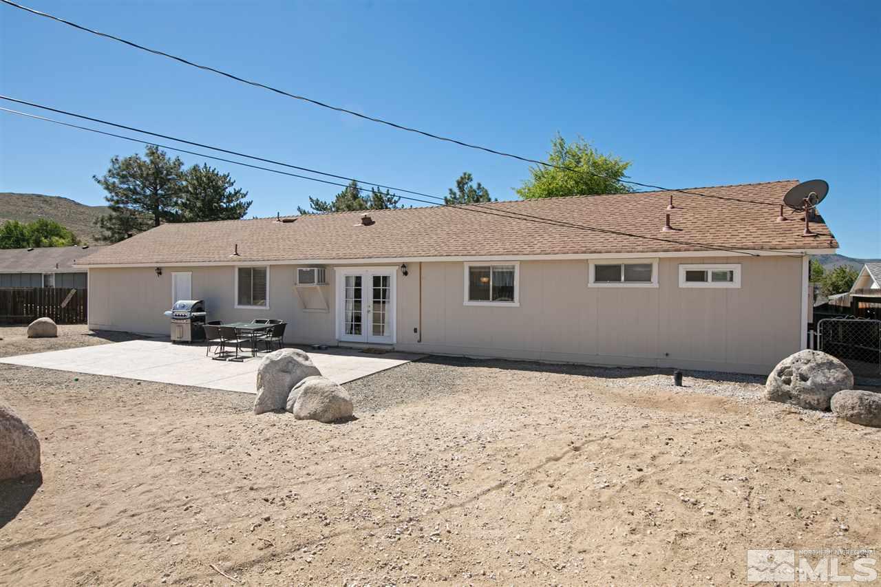 3600 Peregrine Court Reno, NV 89508 - Photo 24 of 36 a front view of a house with a yard