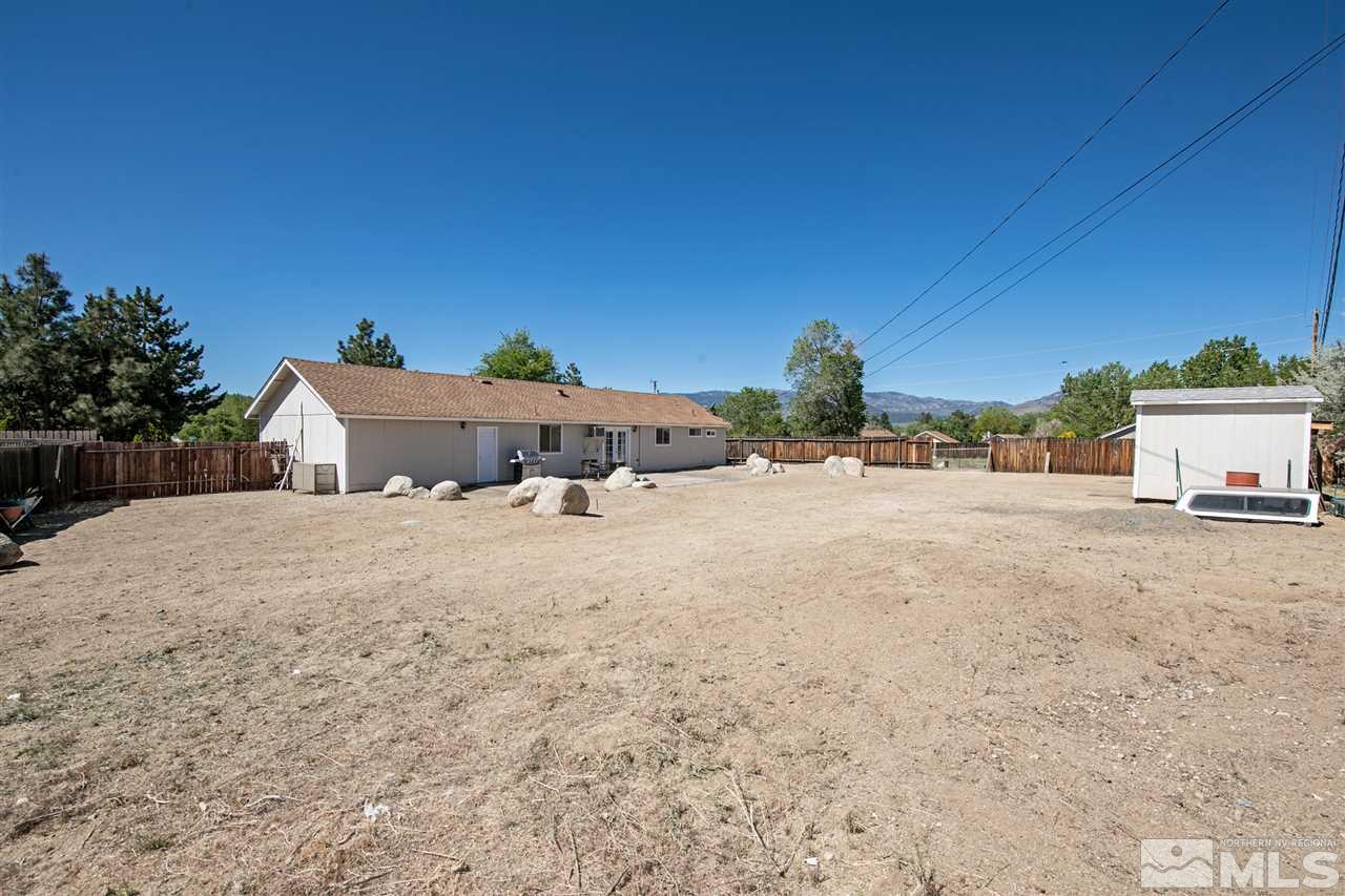3600 Peregrine Court Reno, NV 89508 - Photo 28 of 36 a view of a house with a yard