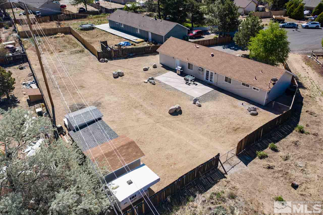 3600 Peregrine Court Reno, NV 89508 - Photo 34 of 36 an aerial view of a house with backyard