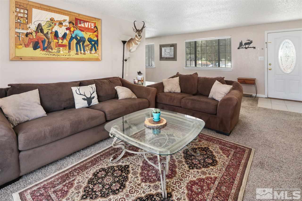 3600 Peregrine Court Reno, NV 89508 - Photo 4 of 36 a living room with furniture and a rug