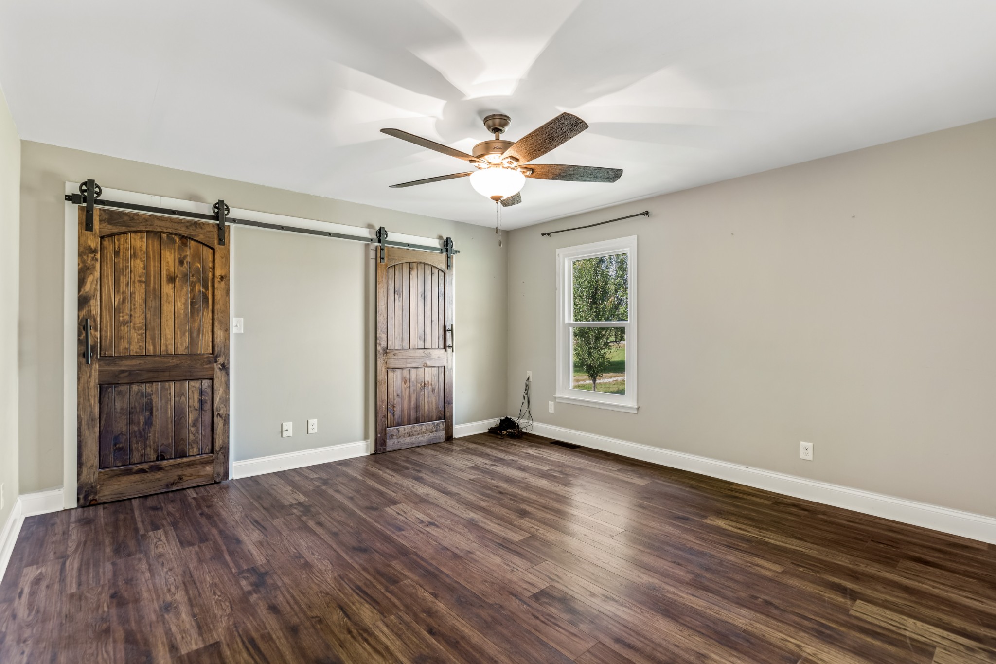 340 Double Log Cabin Road Lebanon, TN 37087 - Photo 18 of 50 wooden floor in an empty room with a window