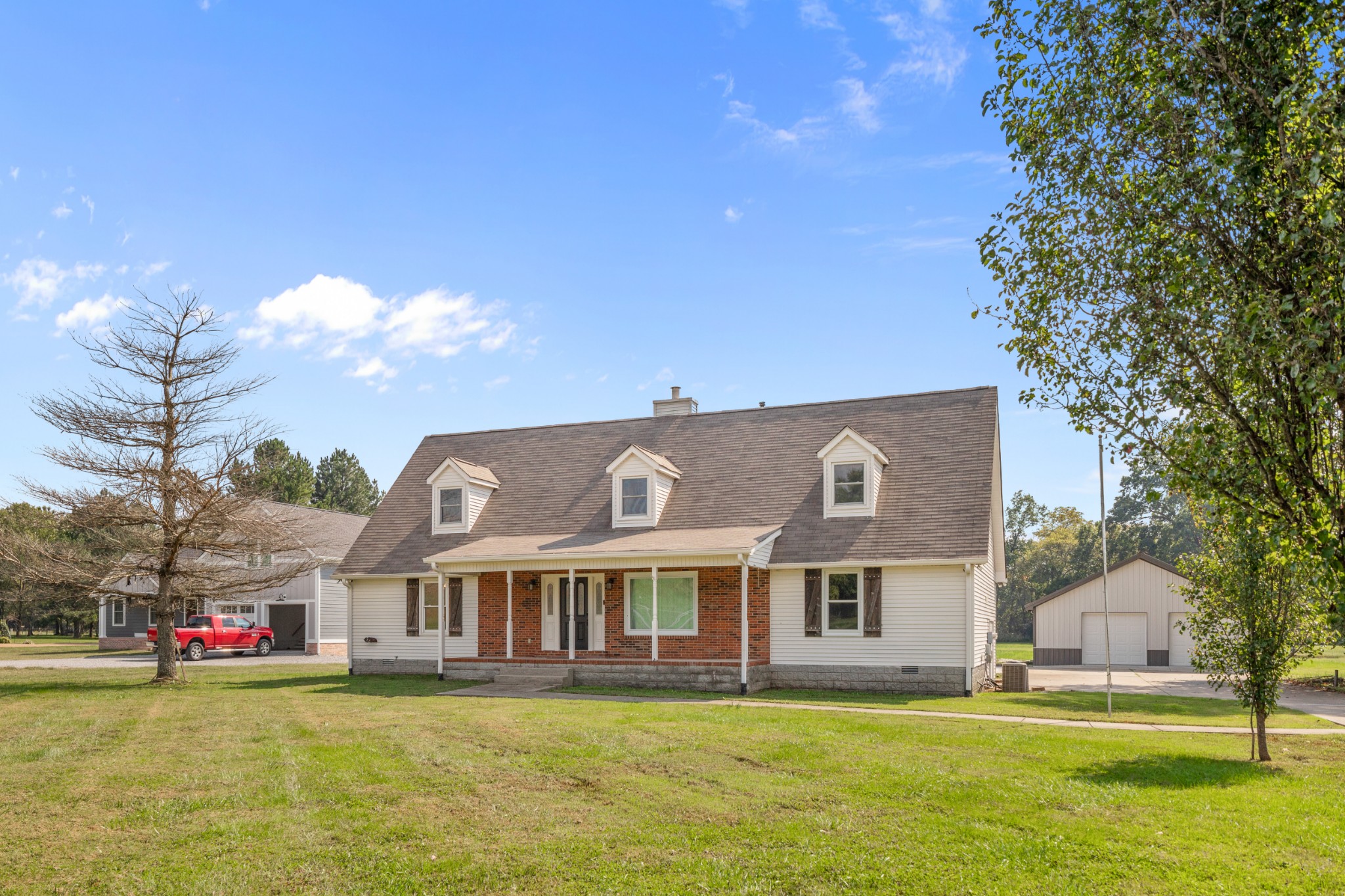 340 Double Log Cabin Road Lebanon, TN 37087 - Photo 3 of 50 a view of a house with a big yard and large trees