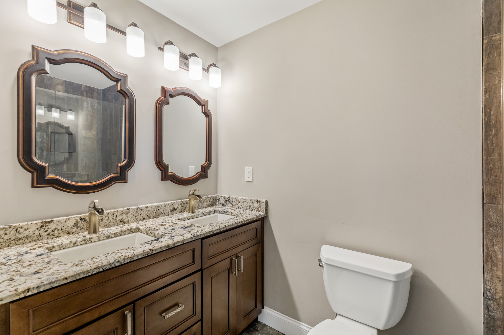 340 Double Log Cabin Road Lebanon, TN 37087 - Photo 21 of 50 a bathroom with a granite countertop toilet sink and mirror