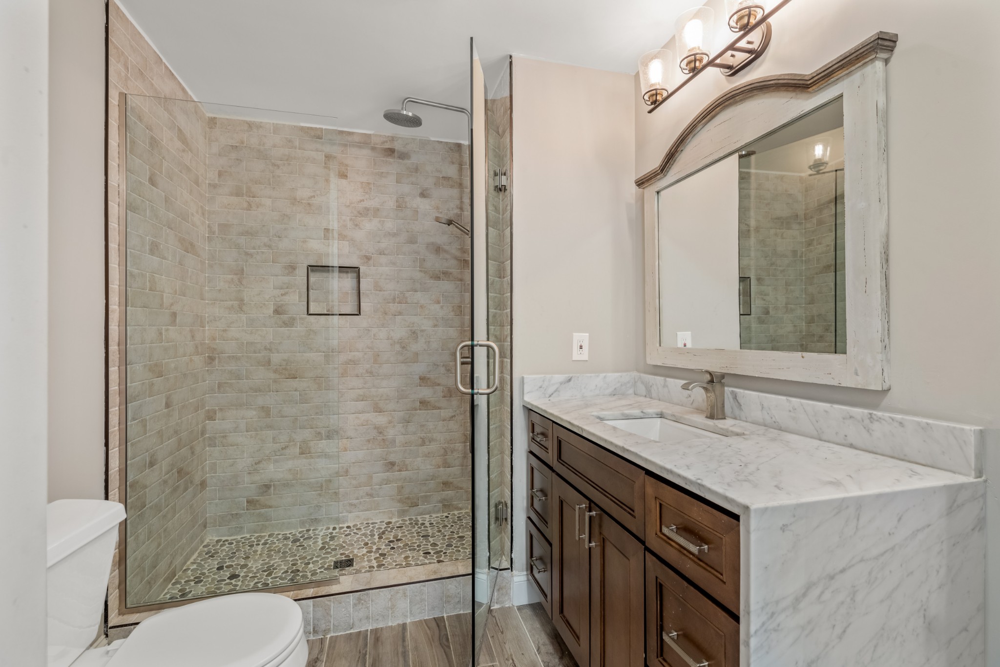 340 Double Log Cabin Road Lebanon, TN 37087 - Photo 27 of 50 a bathroom with a granite countertop sink toilet and shower