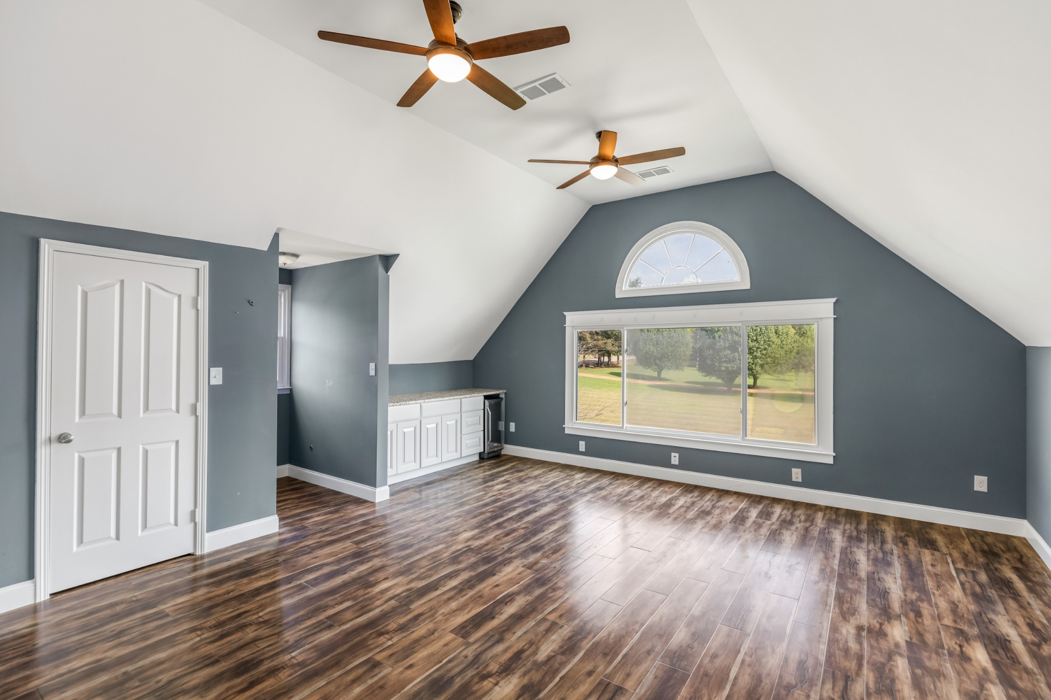 340 Double Log Cabin Road Lebanon, TN 37087 - Photo 32 of 50 wooden floor in an empty room with a window