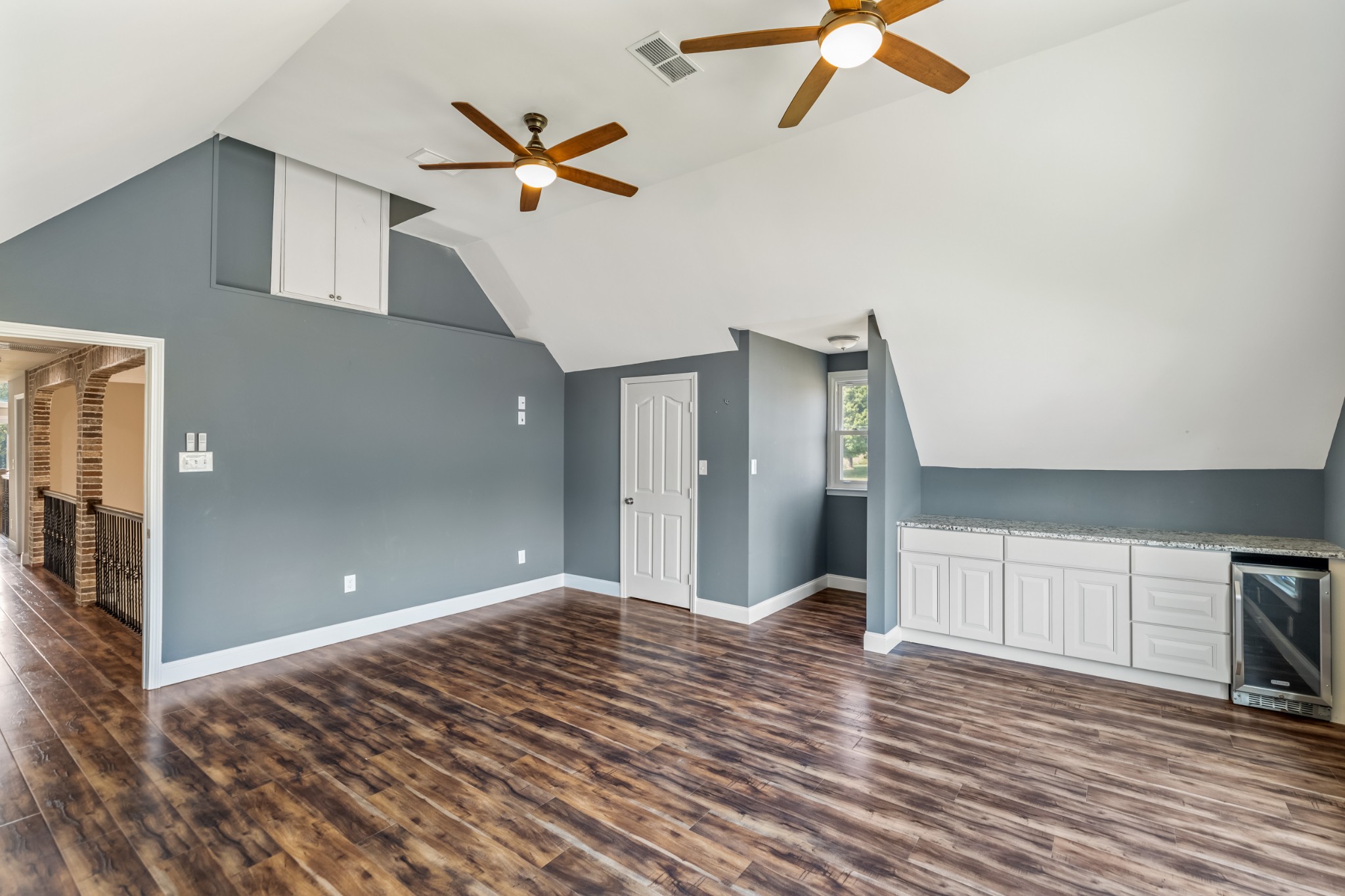 340 Double Log Cabin Road Lebanon, TN 37087 - Photo 33 of 50 a view of empty room with wooden floor and ceiling fan