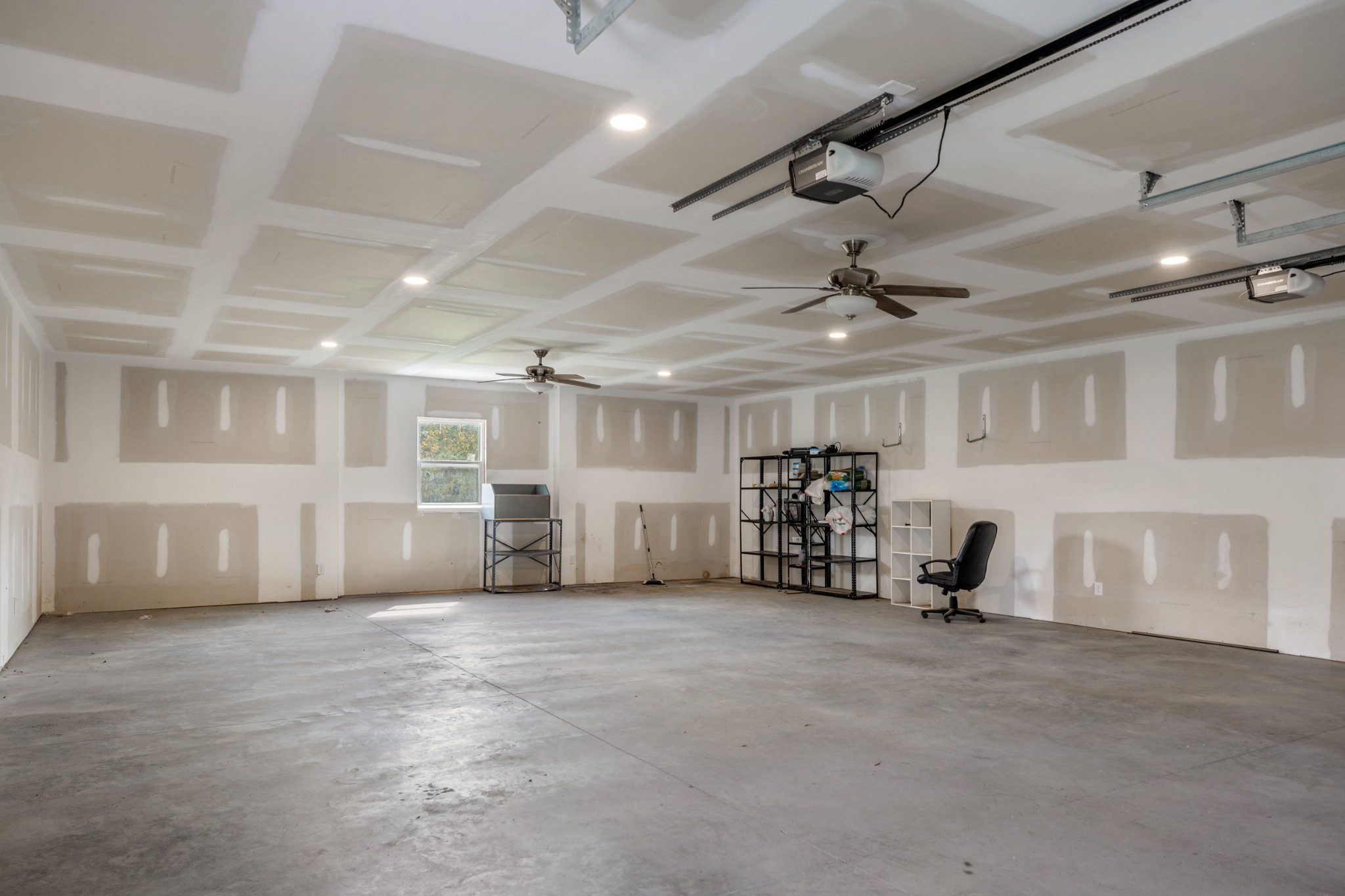 340 Double Log Cabin Road Lebanon, TN 37087 - Photo 46 of 50 a view of a room with gym equipment and a ceiling fan