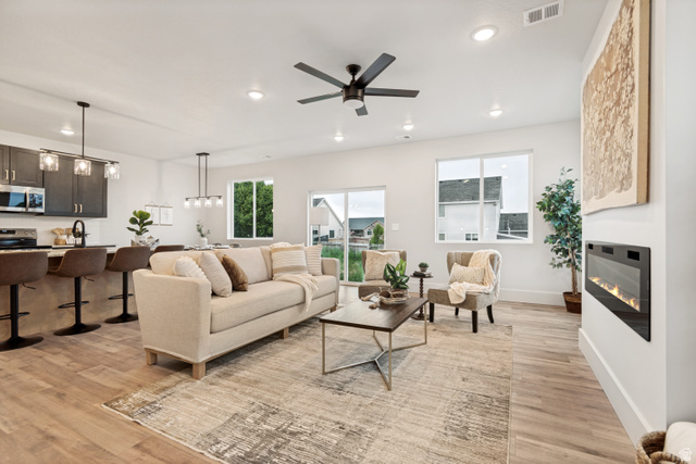 529 North Hvn Drive Mapleton, UT 84664 - Photo 8 of 30 Open-concept living area with wood-finish flooring, a contemporary ceiling fan, and recessed lighting