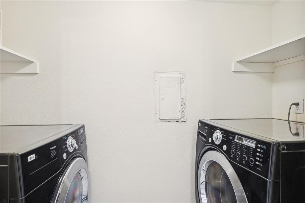 5565 Preston Oaks Road, Unit 262 Dallas, TX 75254 - Photo 16 of 19 a utility room with dryer and washer