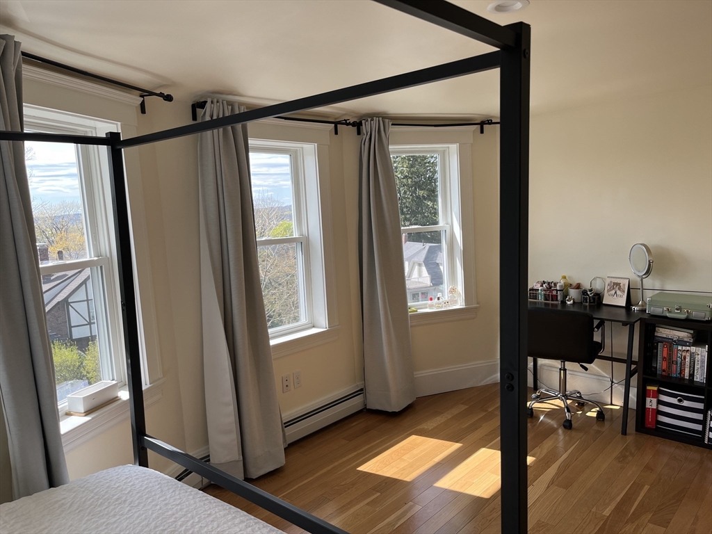 3 Chester Road, Unit 3 Belmont, MA 02478 - Photo 27 of 40 a view of a bedroom with furniture and windows