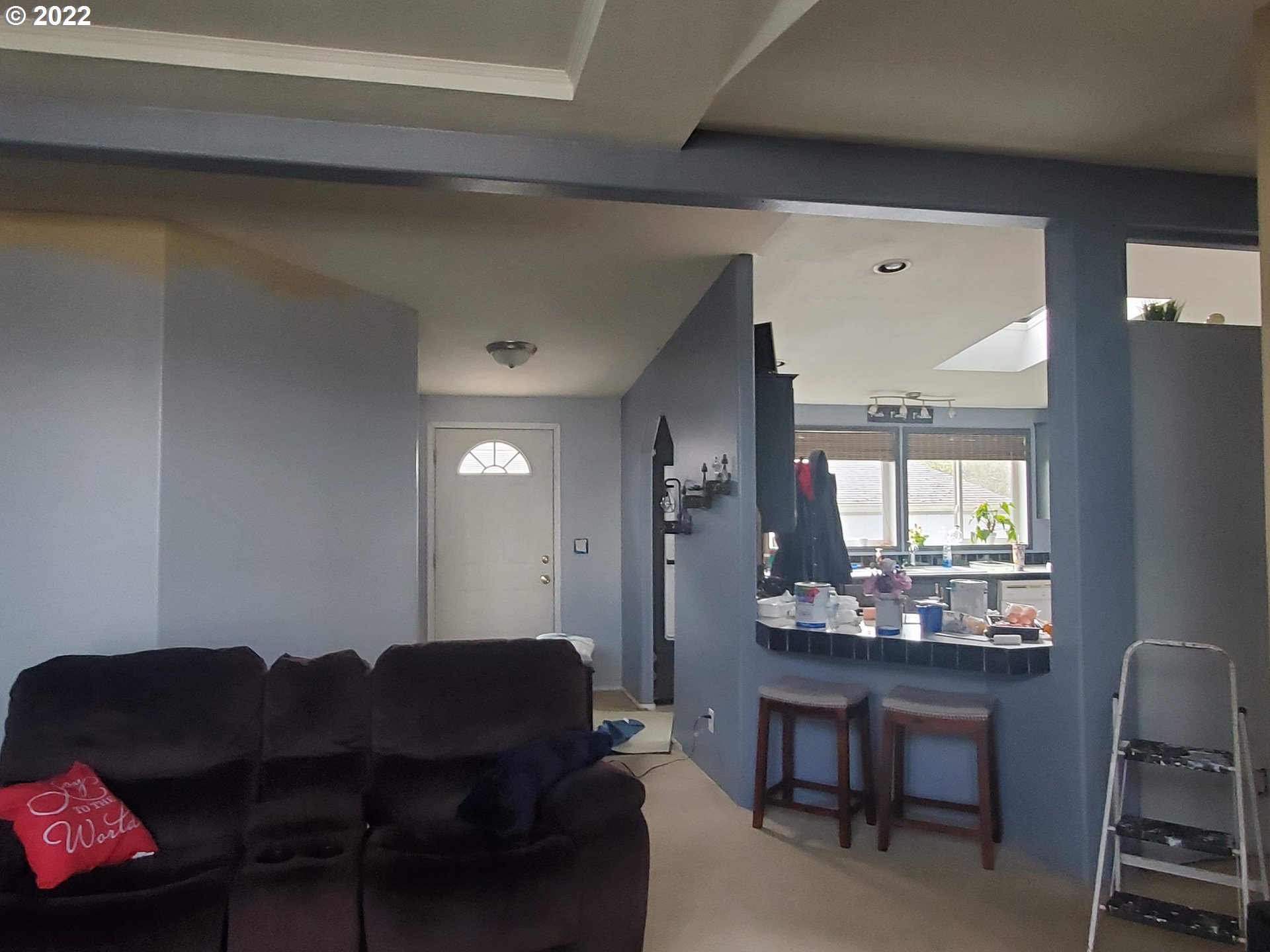 1949 Southeast Palmquist Road, Unit 77 Gresham, OR 97080 - Photo 8 of 30 a living room with furniture and a large window