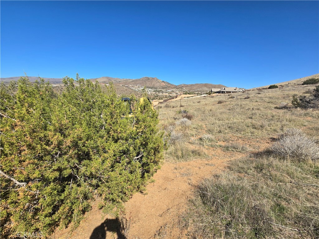 0 White Feather Road Acton, CA 93510 - Photo 16 of 24 a view of a large mountain with mountains in the background