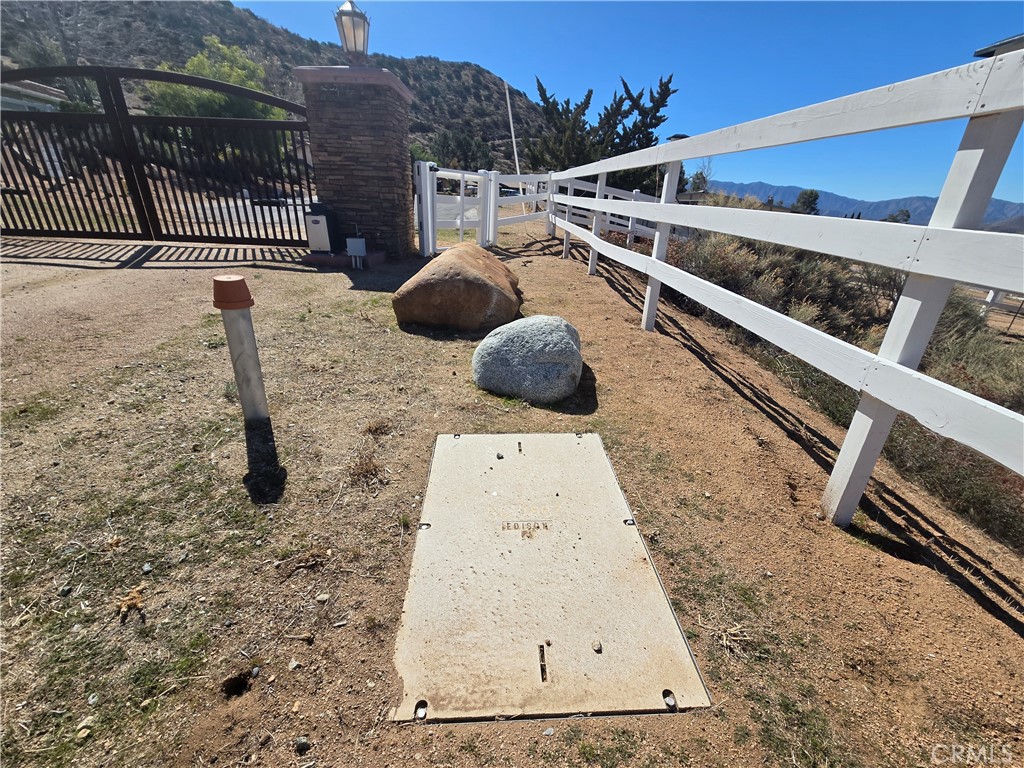 0 White Feather Road Acton, CA 93510 - Photo 4 of 24 a roof deck with table and chairs