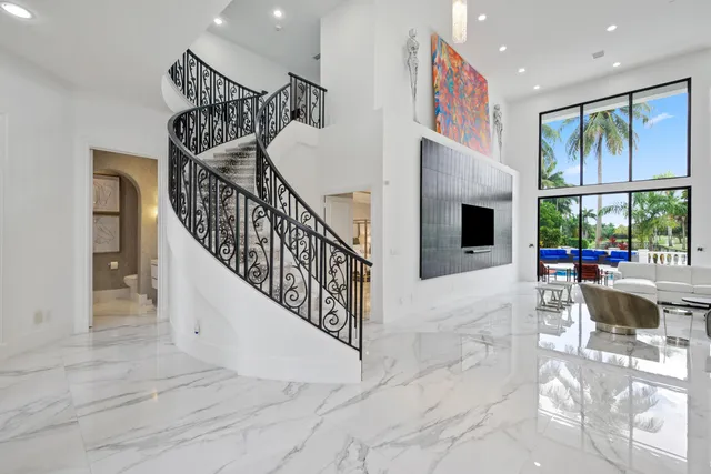 a kitchen with stainless steel appliances granite countertop a stove and a sink
