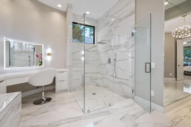 an aerial view of multiple houses with yard