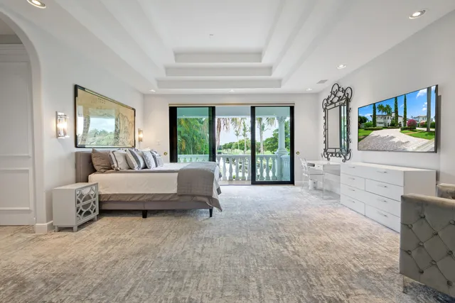 a view of a swimming pool with a table and chair in patio