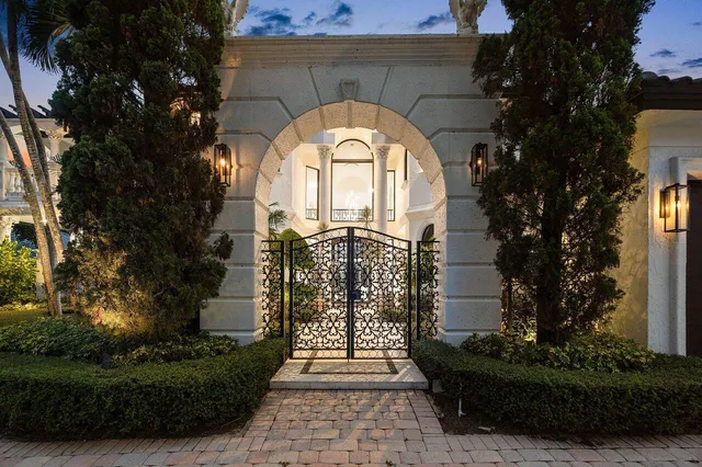 a view of a hallway with furniture