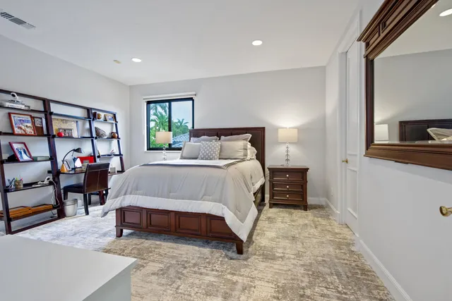 an aerial view of multiple houses with yard