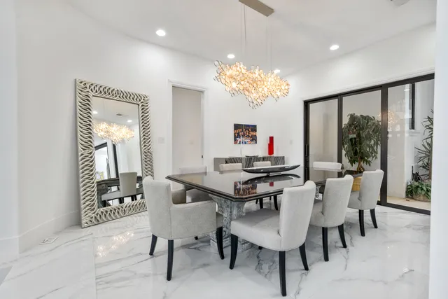 a view of a living room and dining room