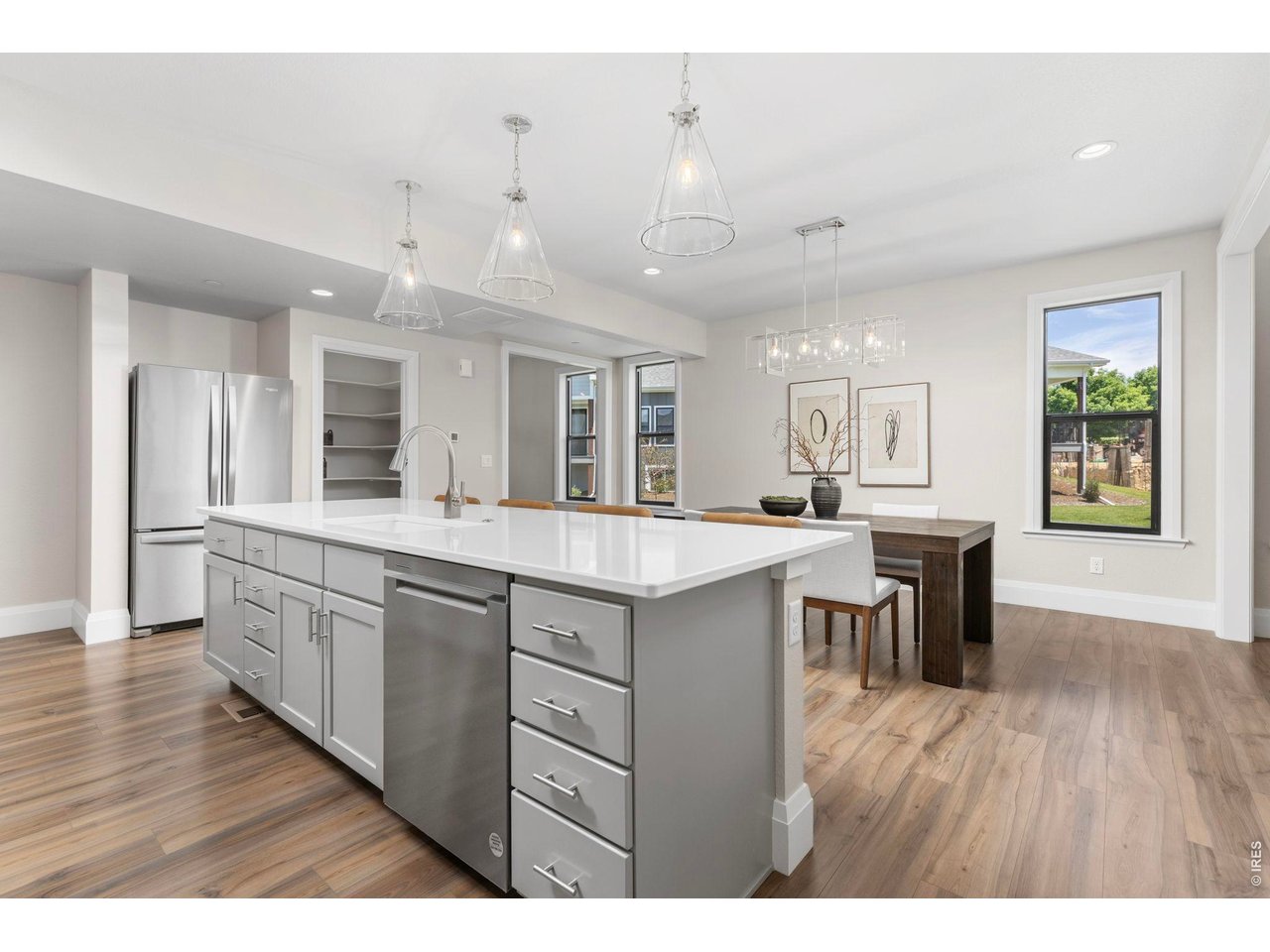 5700 West 2nd Street Road Greeley, CO 80634 - Photo 12 of 40 Custom Shaker style cabinetry with 42" uppers w/ soft-close doors & drawers, and quartz counters are standard