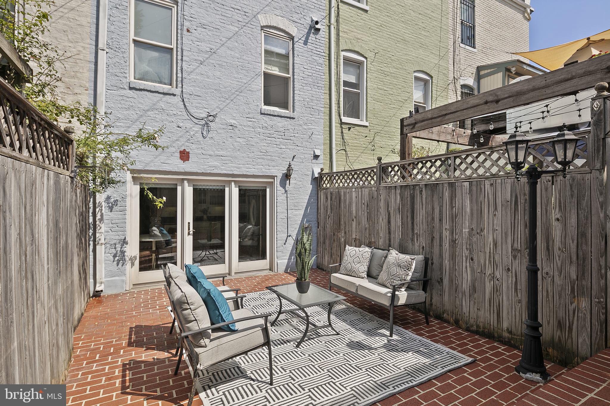 523 F Street Northeast Washington, DC 20002 - Photo 34 of 38 Access to patio from kitchen