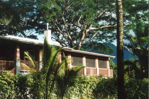5547 Weke Road Hanalei, HI 96714 - Photo 1 of 1 a front view of a house with garden