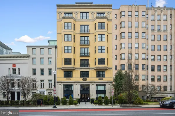 a front view of a building with street view