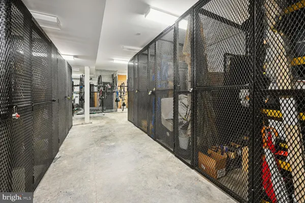 a view of gallery with wooden floor