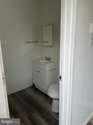 a bathroom with a toilet and a sink
