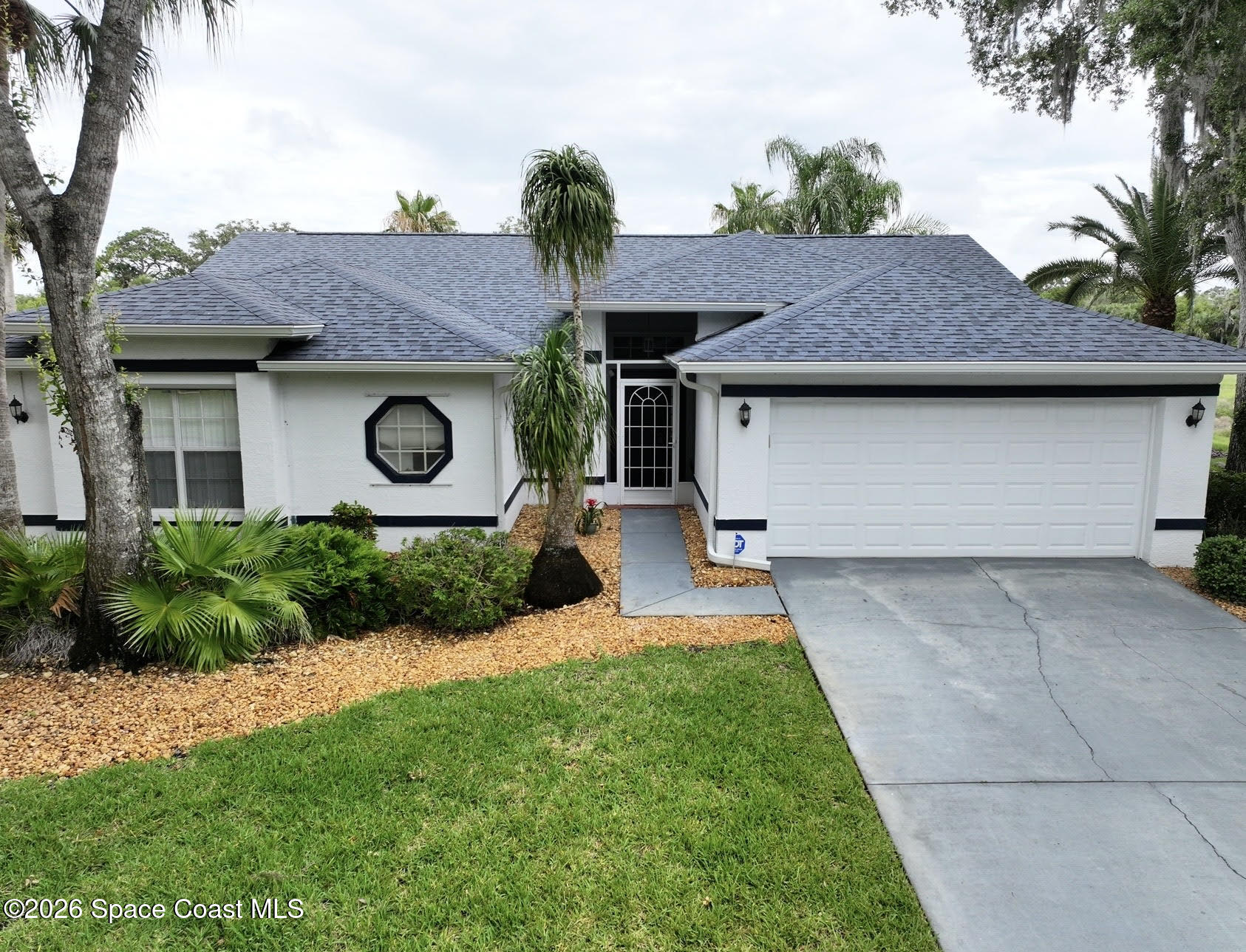 1230 Meadowbrook Road Northeast Palm Bay, FL 32905 - Photo 34 of 43 Curb Appeal