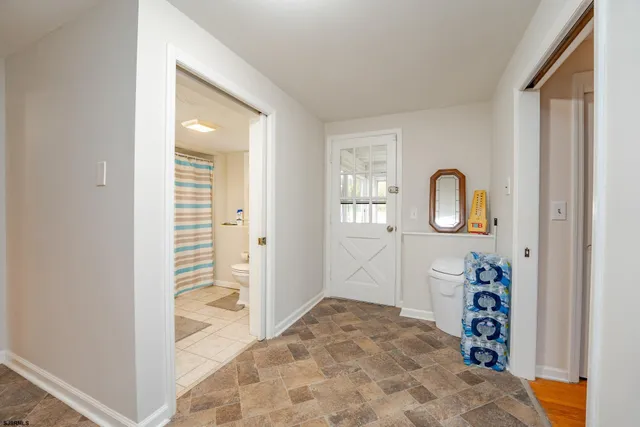 a view of a swimming pool with an outdoor seating