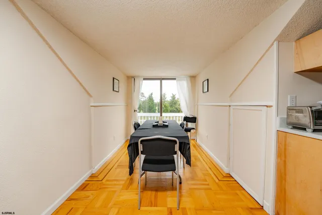 a bed room with bed and a night stand