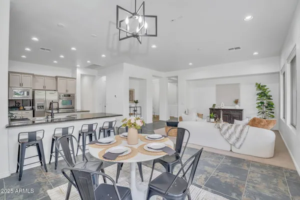 a view of a dining room with furniture