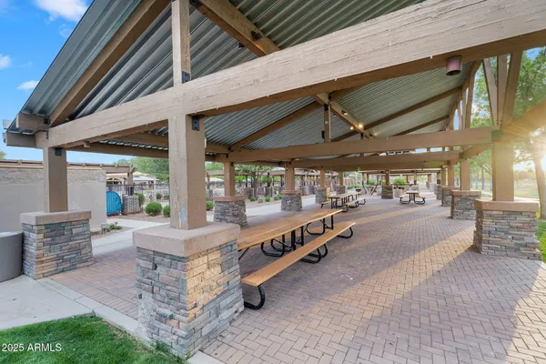 a view of a swimming pool with a patio