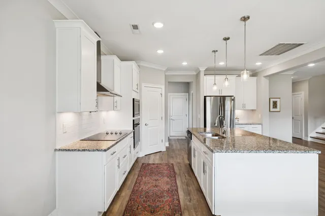 a view of staircase with wooden floor and staircase