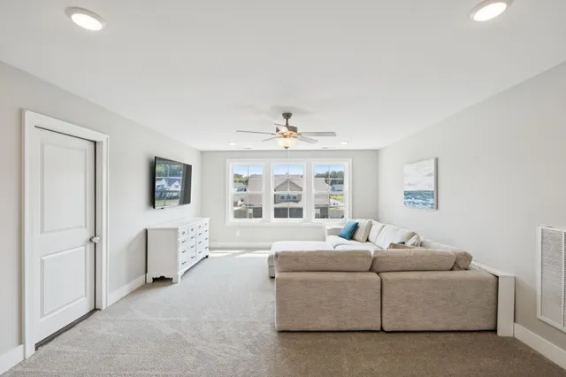 a view of swimming pool with a table and chairs