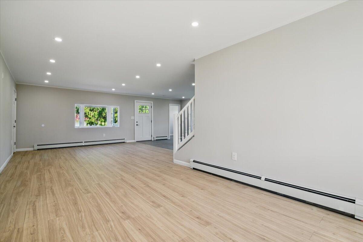 1652 Bonser Road Saylorsburg, PA 18353 - Photo 20 of 62 an empty room with wooden floor and windows