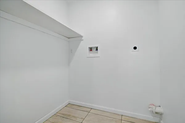 a bathroom with a bathtub and a sink